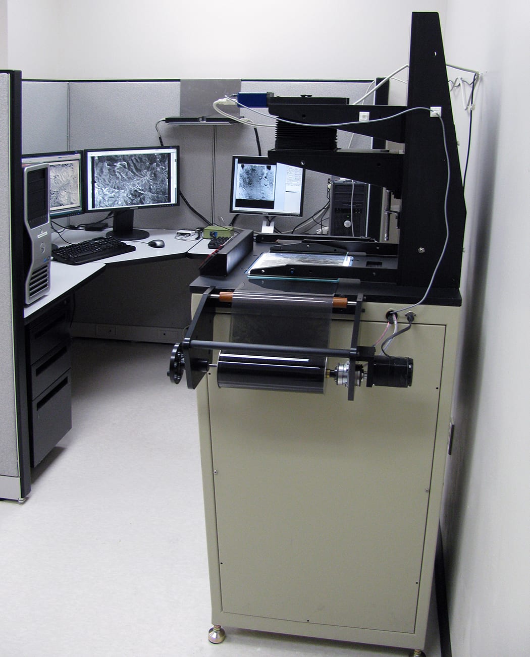 A film scanning workstation at USGS EROS, 2012 — survey film crossing into the digital archive this section is drawn from.